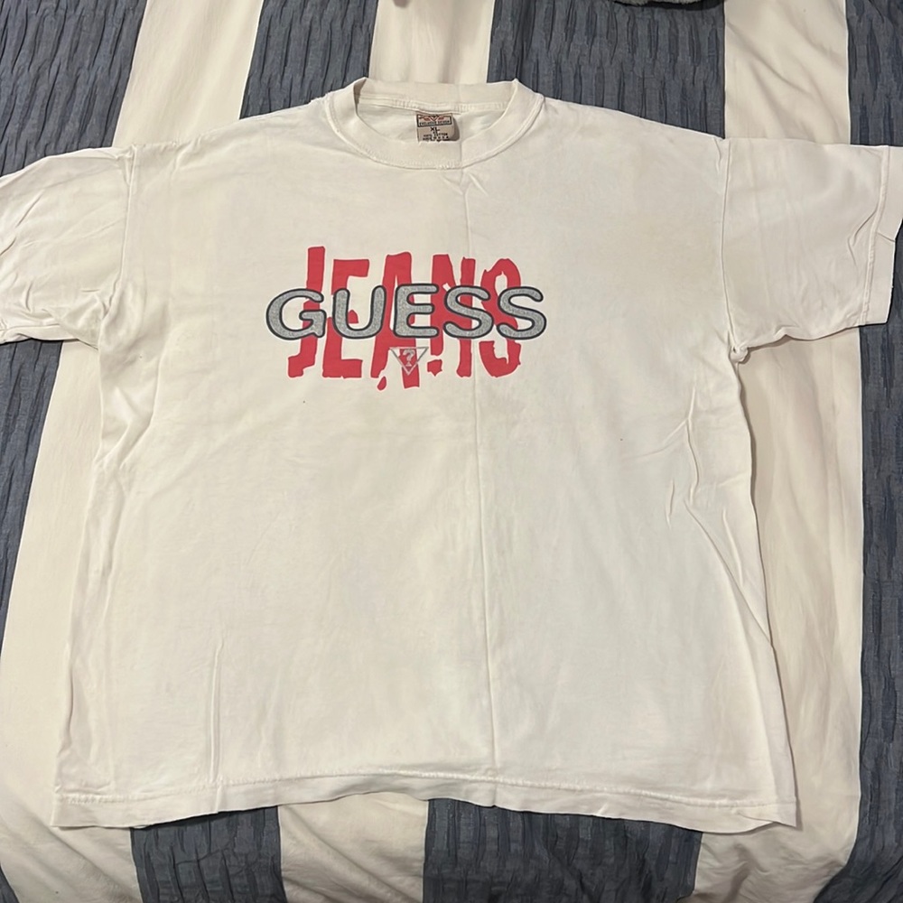 Vintage 1990s Guess Tee Made in the USA Tag Size Xl Fit size M.
